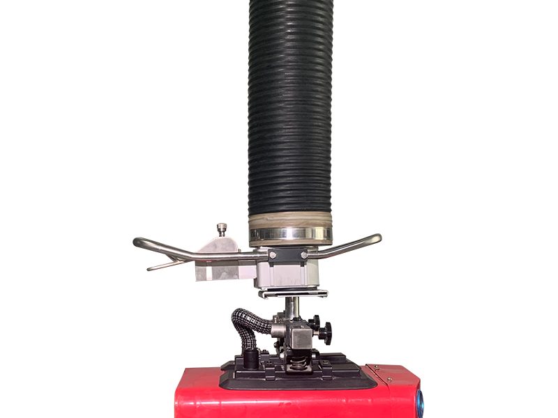 ESL-SG vacuum tube lifter with carton pads resting on a box
