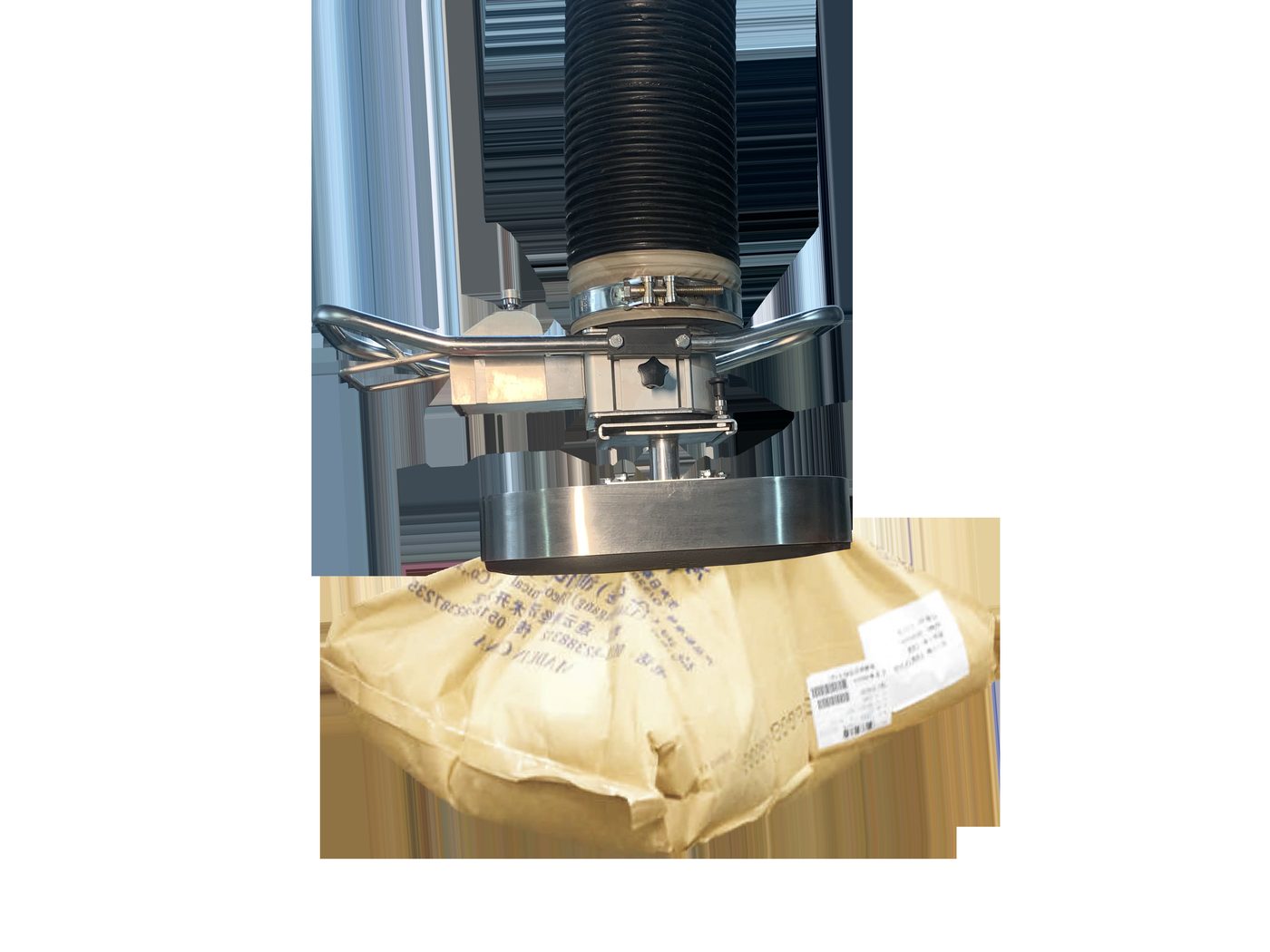 ESL-SG vacuum tube lifter gripping a paper sack during a test lift