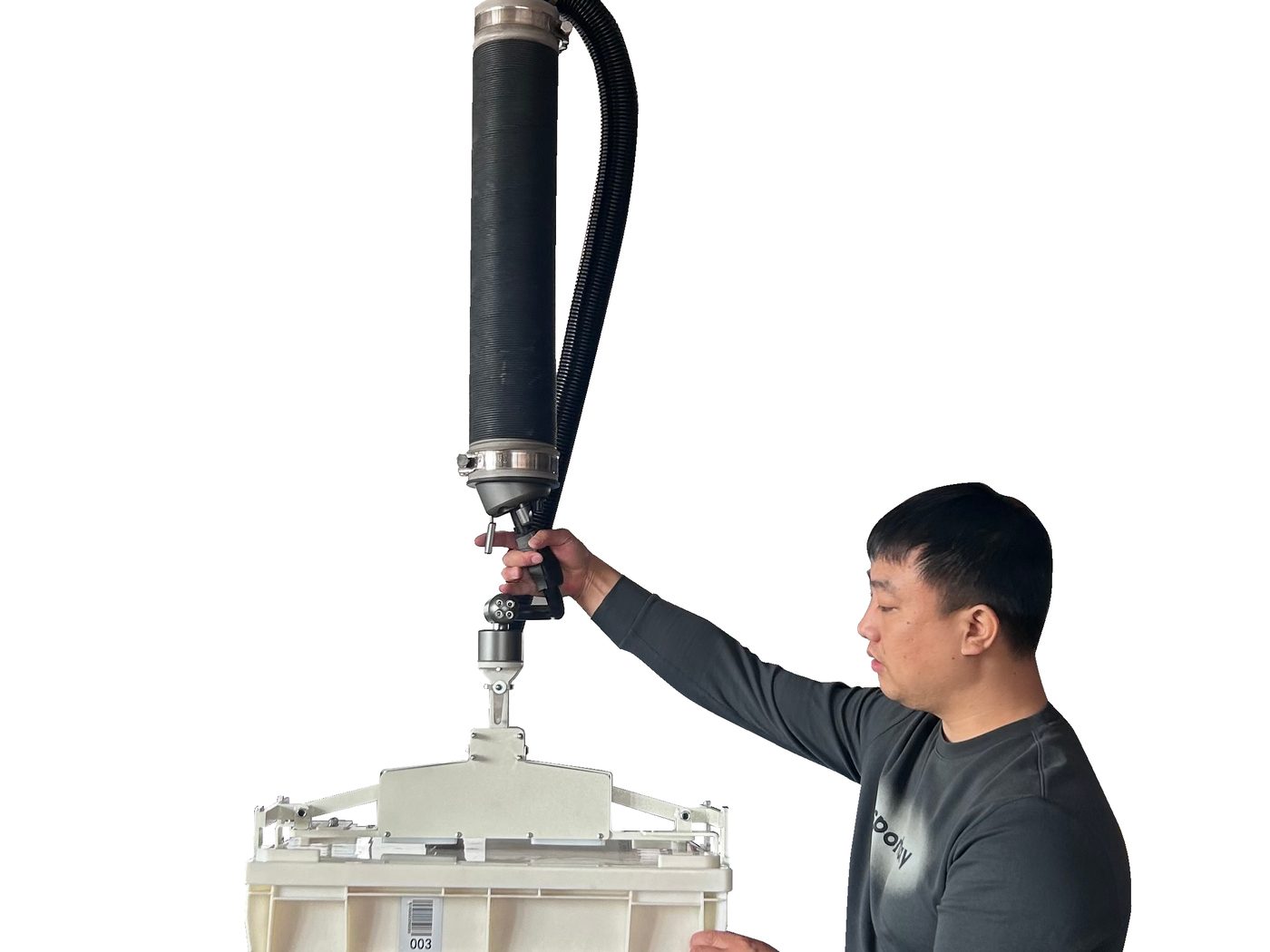 ESM vacuum tube lifter lifting a machine housing in the workshop